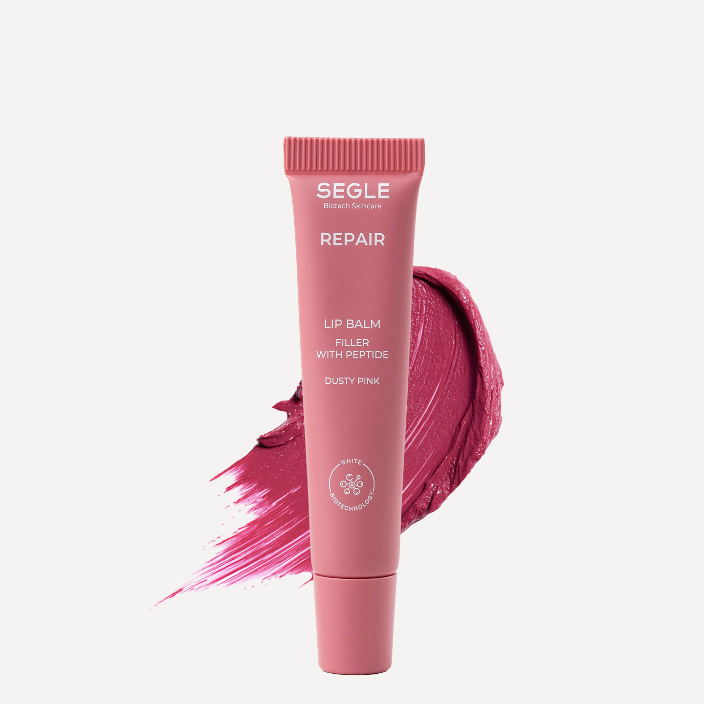 Envase labial 10ml de color rosa empolvado con textura detrás sobre fondo blanco