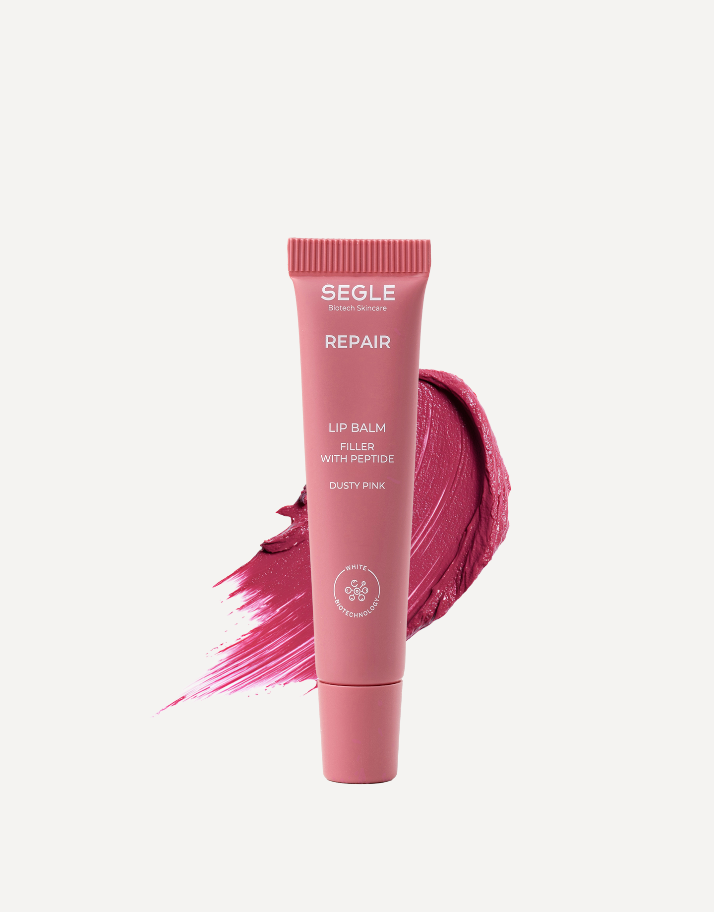 Envase labial 10ml de color rosa empolvado con textura detrás sobre fondo blanco
